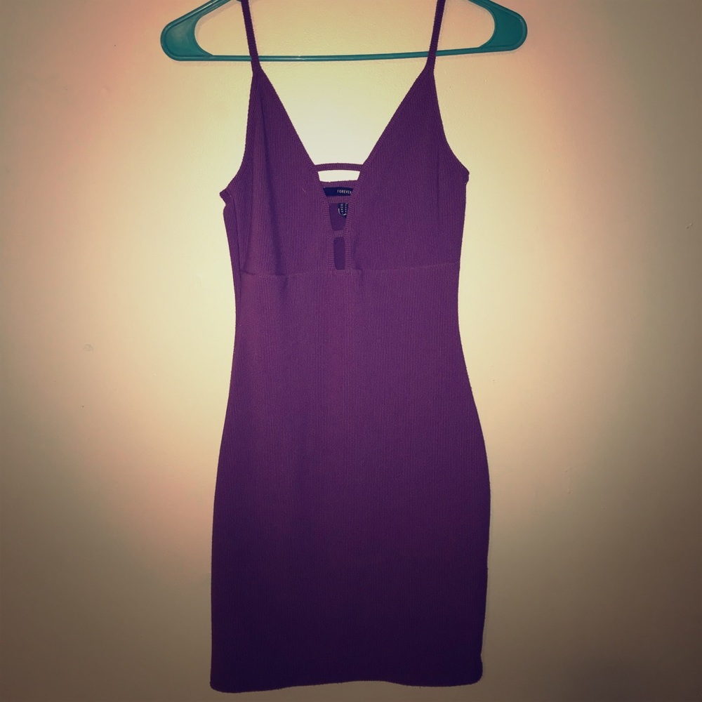 Woman’s purple dress
